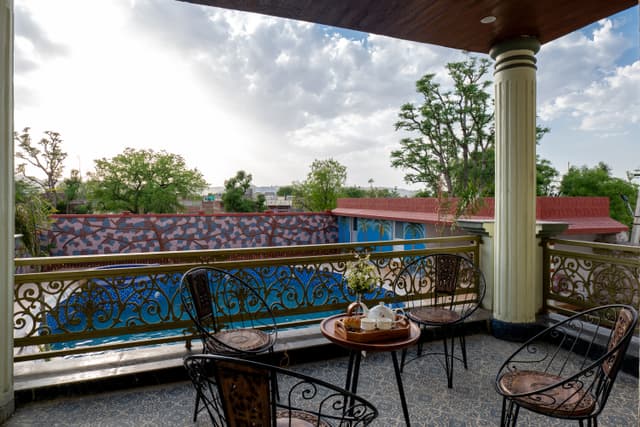Gold Palm Macaroon | Family Suite in a Serene Resort with Shared Pool, Dining, & Garden | Near Popular Tourist Attractions, 4