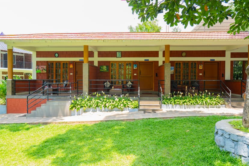 Avocado Cottages Executive Room | Pet-friendly Stay With Private Patio & Common Garden Amid Avocado & Coffee Estate Plantation