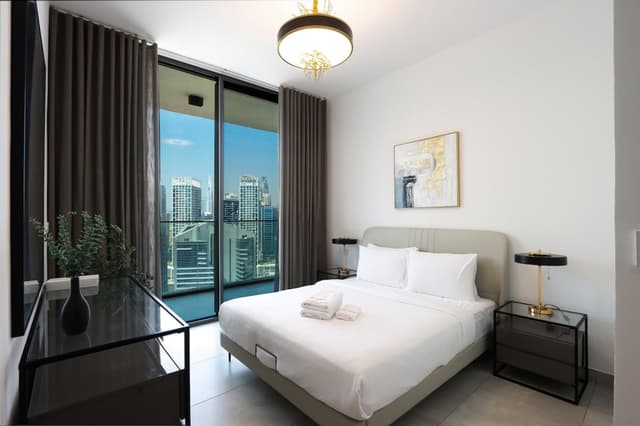 1BR Paragon Tower | Burj Khalifa & Canal Views, 5