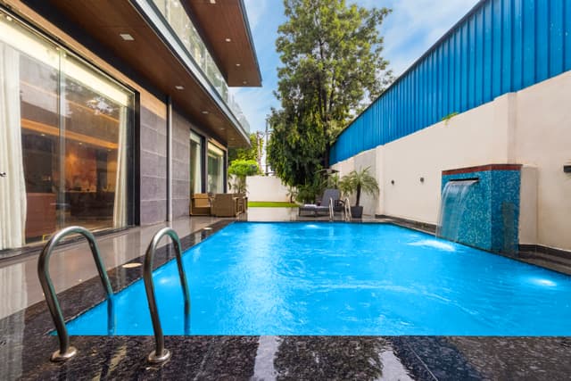 DSG Farm | Pet- friendly modern house Inspired 3-BHK with Bar with lounge, Jacuzzi Private Pool, Swimming pool, Terrace & Garden, 3