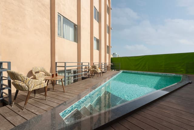 Velora Royale | Deluxe Twin-beds Room in a Hotel with Shared Swimming Pool, Reception, Banquet & Party Space, 3