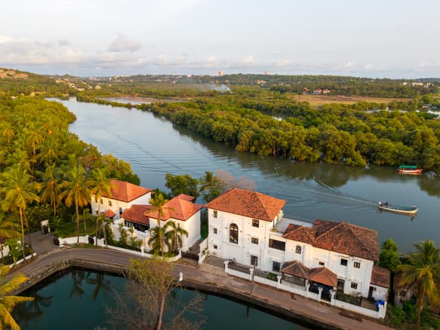 Villa Riviere | Private Riverfront Estate with 6-BHK & 3-BHK, 2 Infinity Pools, Lift, Lounge Area & Kids' Room | 3 Km from Candolim, 2