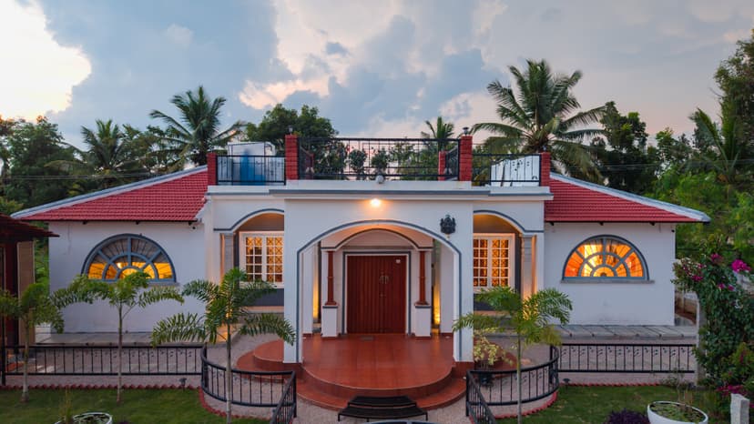 Arka Elysia | Vibrant 3-BHK Heritage Villa with Red-Brick Cabana, Arched Interiors, Swing Sit-Out, Lush Garden, Fire Pit & Lantern-Lit Alfresco Dining