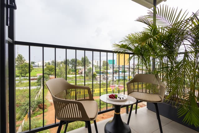Savian Suites Eevan | Queen Bed Room with Balcony in a Business Hotel in Chikkajala, Near Popular Restaurants, Bars & Clubs, 4