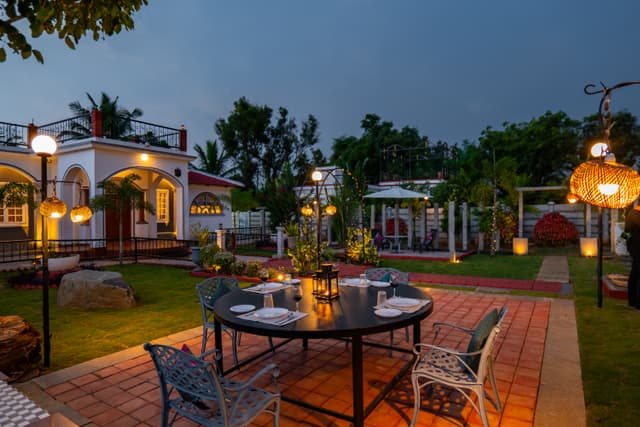 Arka Elysia | Vibrant 3-BHK Heritage Villa with Red-Brick Cabana, Arched Interiors, Swing Sit-Out, Lush Garden, Fire Pit & Lantern-Lit Alfresco Dining, 3