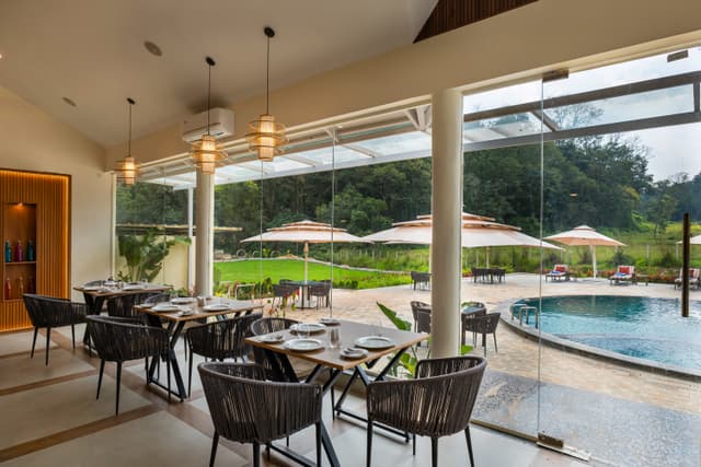 Starlight Serra Vasudha | Duplex Cottage With Forest-View Balcony, Shared Pool, Restaurant & Kids Play Area, 4