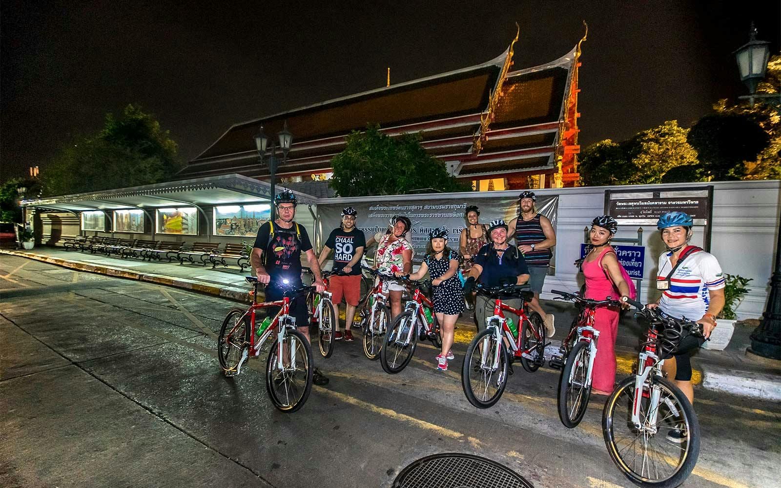 Bangkok Night Bike Tour with Temples & Flower Market